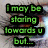 Green text on black background overlays a close-up of an eye with long eyelashes and colorful iris, displaying two sequential phrases.