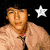 Six distinct pixelated portraits of a young man with dark curly hair, each in different poses and backgrounds including stars, text, hearts, sunglasses, and grayscale effects.