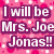 Pink pixelated background with white text reading "I will be Mrs. Joe Jonas!!" and a side profile of a person with dark hair wearing black clothing, below which is the text "Soo cute!"