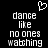 Black background with white pixelated text reading 'dance like no ones watching' and a small heart symbol above the left side of the text.