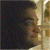Pixelated image of a person with dark hair and light skin on left, green background with bright green text 'OriginalIcons.com' on right.