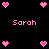 Pixelated pink hearts and the name 'Sarah' displayed on a black background in two identical static arrangements.