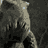 King Kong's face in three showing mouth opening from closed to wide, with 'KING KONG' text below in blue gradient on black