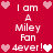 Red background with white pixelated text reading "I am A Miley Fan 4ever!" surrounded by pink and white heart icons.