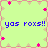 Pixelated green background with pink floral border and blue text reading "yas roxs!!" repeated four times in a