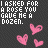 Pixelated text and pink hearts on dark background with gray rectangle in bottom-right corner.