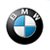 Circular logo with black outer ring and blue-and-white quadrant center, rendered in pixelated style on white background.