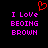 Red pixelated heart symbol above pink text reading 'I Love BEOING BROWN' on black background.