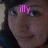 A pixelated image of a person with dark hair and light skin, featuring pink text overlays that change across frames.