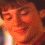 A person with short brown hair and closed eyes appears in four -aligned showing subtle facial expression changes