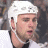 Pixelated image of a hockey player in white gear with text 'Dan Focht #4' and Pittsburgh Penguins logo on separate