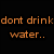 Pixelated image with orange text on black background and two goldfish in water, displaying distorted text overlays.