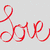 Red cursive 'Love' text on gray background, peace symbol with green and pink floral border, yellow smiley face on white background.