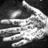 Black-and-white animated sequence showing a hand with fingers extended, accompanied by sequential text overlays.
