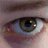 six eye close-ups with pixelated text overlays showing progressive word additions