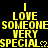 Yellow pixelated text on black background reads "I LOVE SOMEONE VERY SPECIAL" with heart symbols, arranged in three horizontal and one vertical