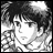 Black-and-white pixelated image of a character with dark hair and a patterned garment, alongside stylized text on a black background.