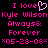 Pixelated pink text on black background reads 'I love Kyle Wilson Always& Forever *05-28-08*' with a heart symbol replacing the 'o' in 'love'.