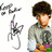 Pixelated image shows a character with brown hair and beard wearing gray shirt with dark emblem, holding a white object with pink accents against white background.