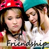 Two people wearing helmets with 'Friendship' text overlaid on the image.