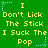 Green background with yellow text repeating 'I Don't Lick The Stick I Suck The Pop' in three , surrounded by blue and green star-shaped pixel decorations
