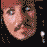 Pixelated image divided into four quadrants showing a person's face, blue jeans, pink and purple objects, and text reading "MY Favorite Things!" on gray background.