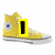 Pixelated high-top sneakers in yellow, light blue, and pink with text overlays on each shoe.