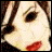 Animated icon of a stylized face with red lips and dark hair, displaying changing text and symbols above the head.