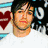 Four distinct pixelated portraits of a man with dark hair in various poses and backgrounds, including heart symbols and layered clothing.