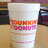 A pixelated Dunkin' Donuts cup with orange and pink text on a white background, next to blue with cyan text reading "Gotta Have My Dunkin' Donuts"