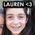 A pixelated portrait of a smiling person with long dark hair, overlaid by a black banner containing the text 'LAUREN' and a right-pointing arrow symbol.