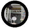Four circular frames display industrial piping systems with varying color filters and lighting conditions.