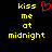 Yellow pixelated text reads 'kiss me at midnight' with a red heart symbol above the word 'me', all on black background.