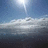 A blue background with a small sky image showing clouds and sun rays, accompanied by pixelated text reading 'those will never be forgotten', '9/11', and 'its ok to cry'.