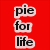 Red background with three stacked white text boxes containing black lowercase letters spelling 'pie for life' in a pixelated font.