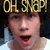 A pixelated image of a person with dark hair and a white shirt, displaying the text "OH SNAP!" in gold lettering above the head