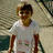 A child in a white shirt stands on stairs with text overlays changing across frames.
