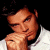 A pixelated contact sheet showing two frames of an animated icon featuring a person in a white shirt on the left and green text reading "Original Icons .com" on the right against a dark background.