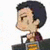 Pixelated cartoon character with dark hair and maroon shirt holding a black device with orange accents, shown in three side-profile views.