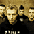 Pixelated static image of four people in dark clothing against a golden background with visible dithering and low-resolution rendering artifacts.