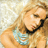 A pixelated contact sheet of two animated frames showing a woman with long blonde hair and a turquoise top on the left, next to text reading "JESSICA SIMPSON IN THIS SKIN" in blue and white sections.