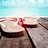 A static image divided into four quadrants: top-left shows a beach scene with wooden planks and red objects, top-right displays orange text on blue background, bottom-left shows orange text on blue background, bottom-right is solid gray.