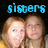 Pixelated image of two people with light brown hair against a dark background, with blue text reading 'sisters' above them.