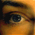 A 3x2 contact sheet of a pixelated animated eye sequence showing gradual color shift from warm orange to cool blue tones across five frames.