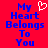 Red background with blue pixelated text reading 'My Heart Belongs To You' and a white pixelated heart symbol above 'My' on the left side.