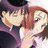 A 48x48 pixel animated buddy icon featuring a close-up of two anime-style characters kissing, with text "Anime IM" and "COM" on the right side against a black background.