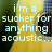 Pixelated text reads 'i'm a sucker for anything acoustic...' over a split background of dark green and yellow with a partial figure on the right.