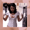 A woman in a white t-shirt with a graphic design stands in a hallway, transitioning through multiple poses with varying arm positions and facial expressions.