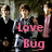 Pixelated image of three figures with pink text 'Love Bug' overlaid on a dark background.