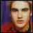 A pixelated animated sequence shows a person in a red shirt against a purple background, with text overlays changing across frames.